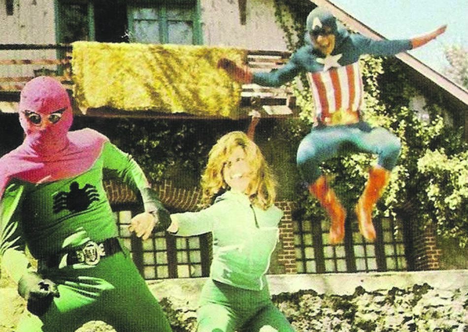 Photo from the movie '3 Dev Adam': Turkish Captain America is trying to save Julie from the Evil Turkish Spiderman.